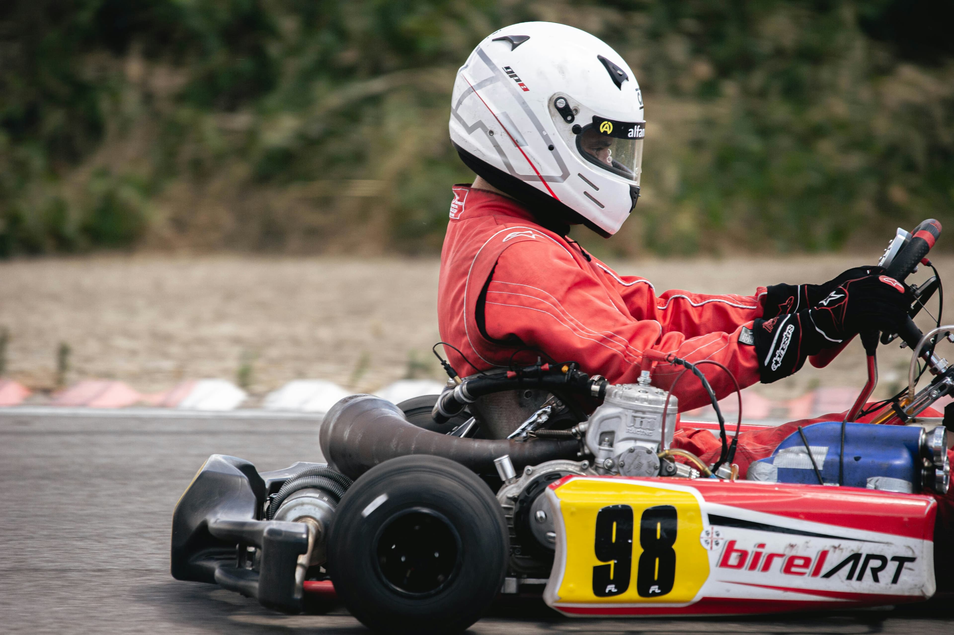 Kart racer reviewing data after a session