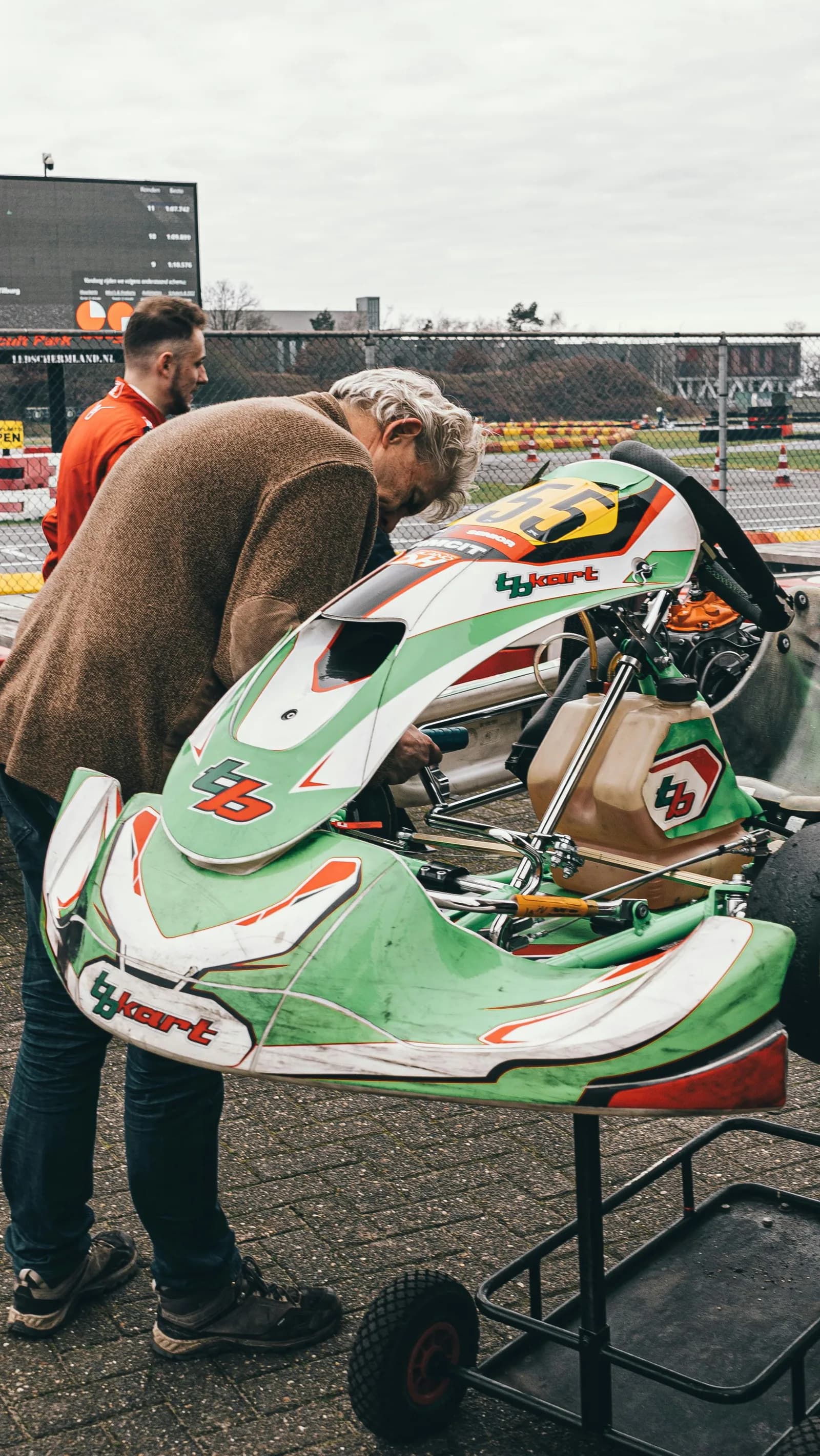 Kart racer analyzing data and lap times